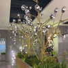 Iluminación personalizada para lámpara con forma de pilar y rama de centro comercial